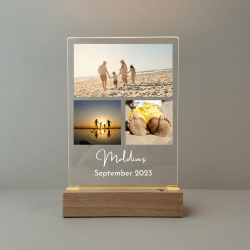 Illuminated acrylic night light featuring three embedded square photo panels emitting a soft glow—ideal for showcasing beloved memories in a warm ambient display.